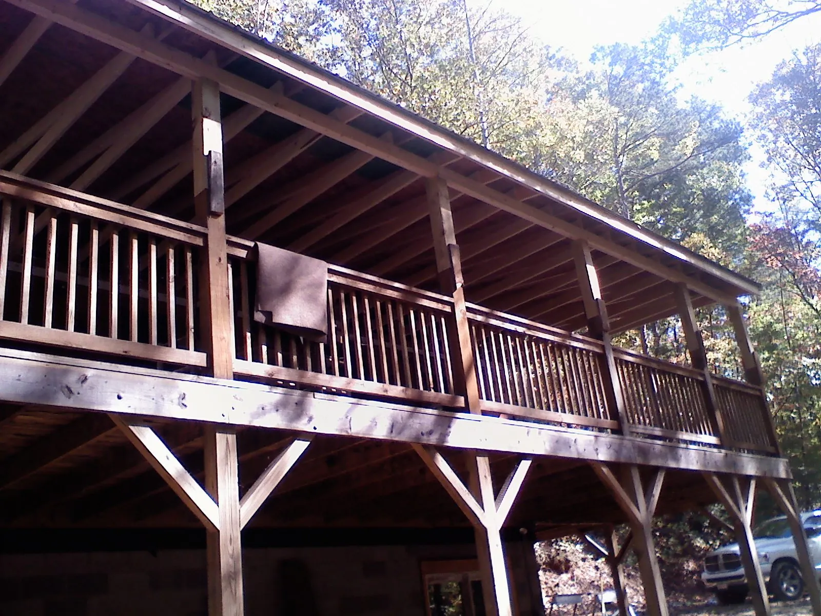 Timber framing under a new elevated porch and deck — Roof Leak Repair in Ellijay by Roofing Brothers